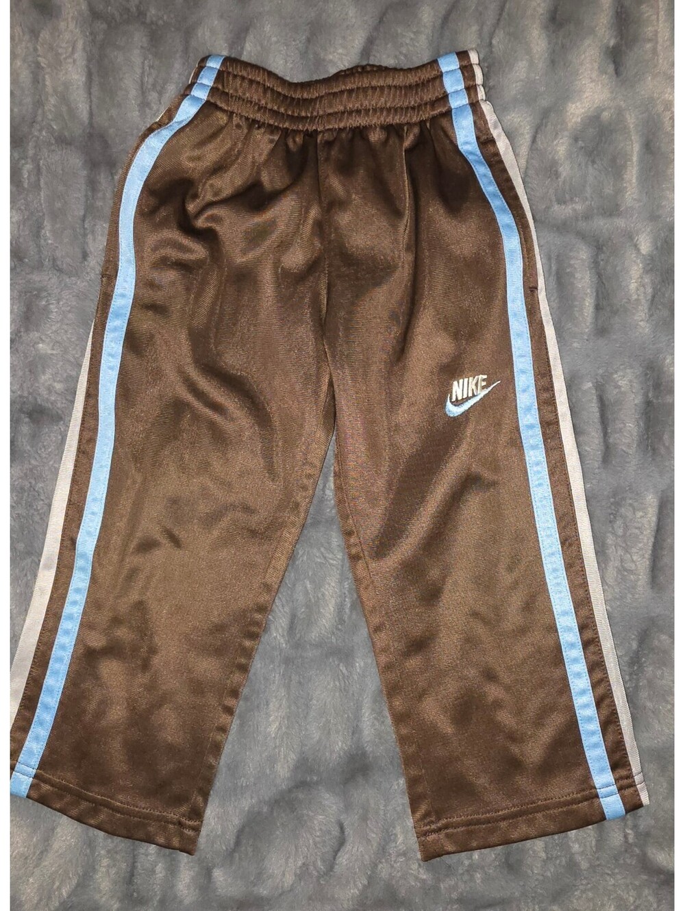 Nike toddler brown track pants with blue side stripes